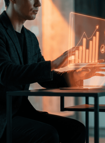 Person analyzing data with holographic AI interface in a modern office.