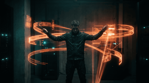 Futuristic man with glowing orange light trails in a dark room.