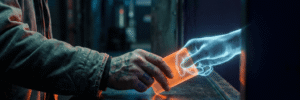 A business owner's hand slides a glowing orange keycard across a dark counter to a translucent holographic hand, a metaphor for a website declaring which actions an AI agent may take